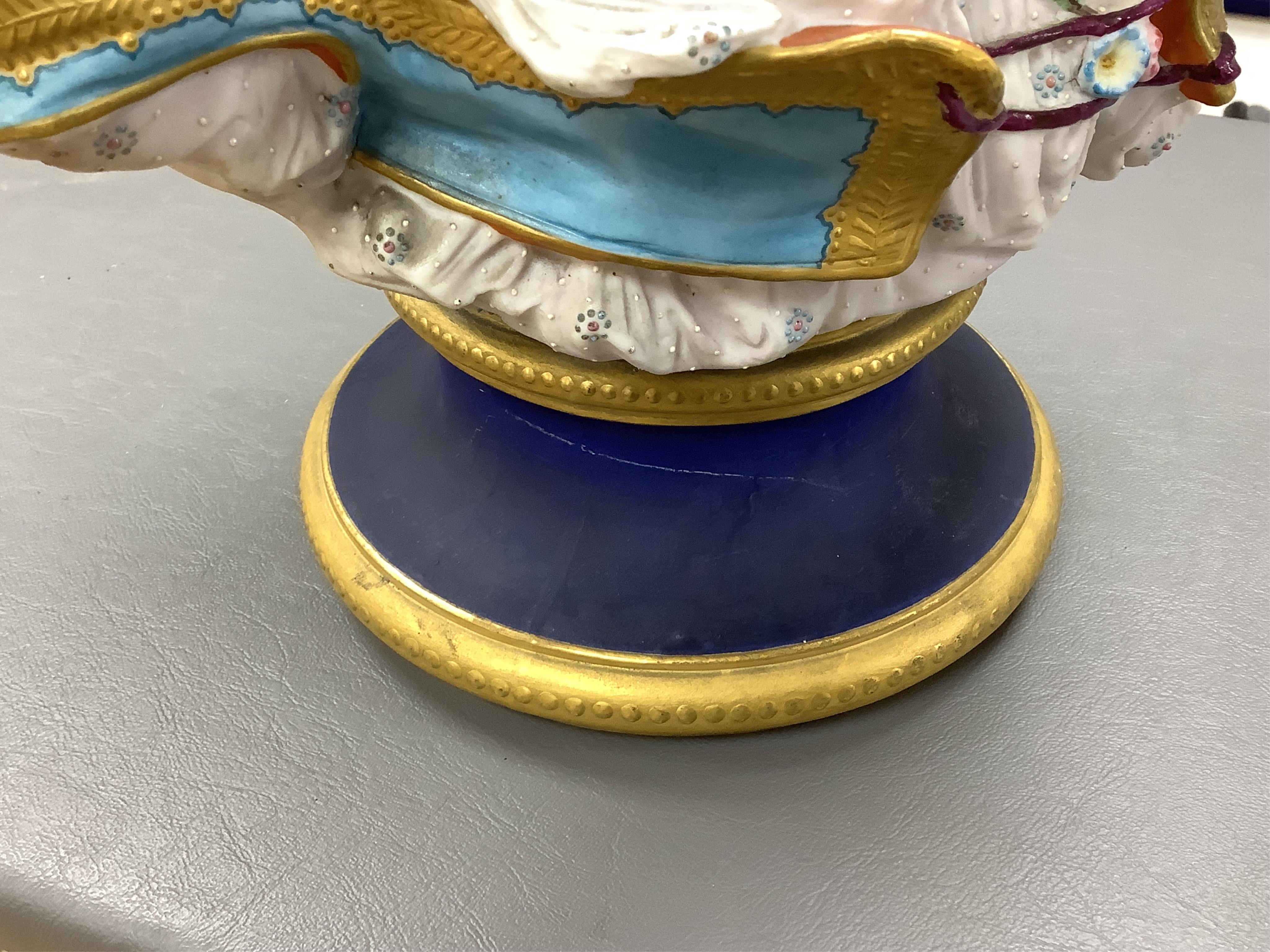 A Paris painted biscuit porcelain bust of a woman, stamped L&M, 50cm